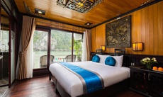 Giường trong phòng chung tại Ancora Cruises