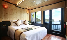 Giường trong phòng chung tại Syrena Cruises