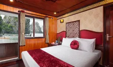 Giường trong phòng chung tại Rosa Cruise